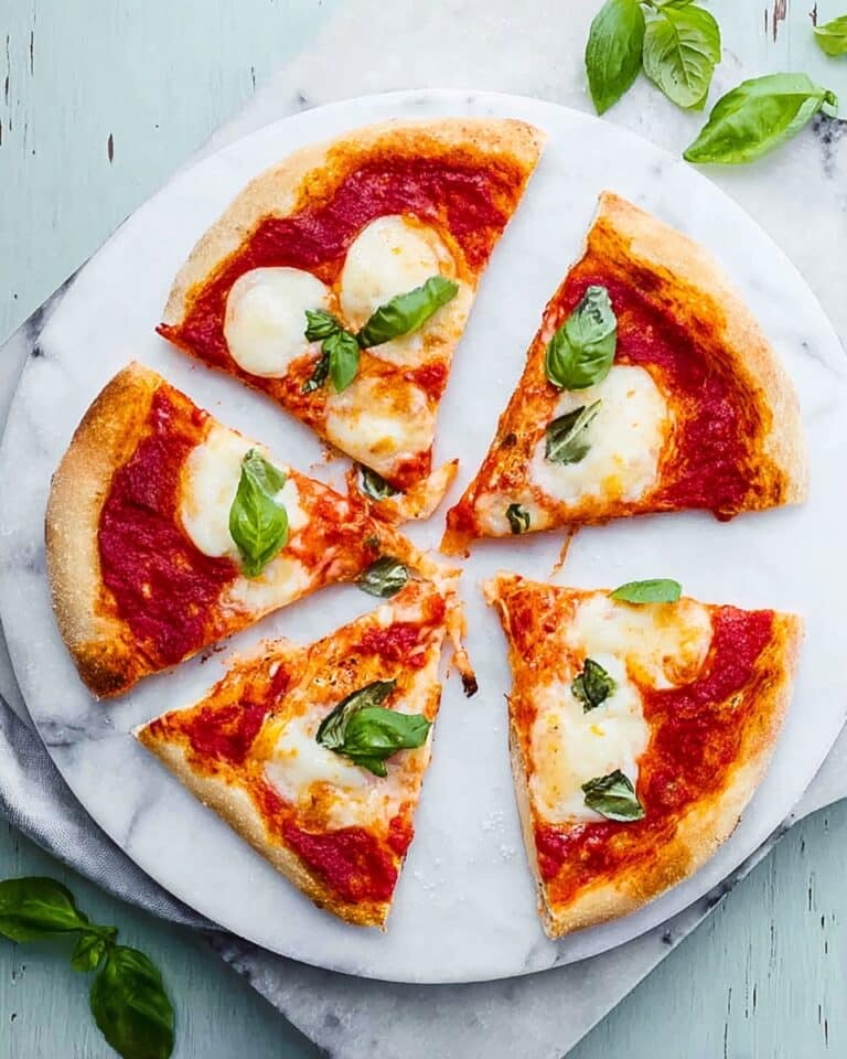 Homemade Margherita Pizza with Fresh Basil Recipe