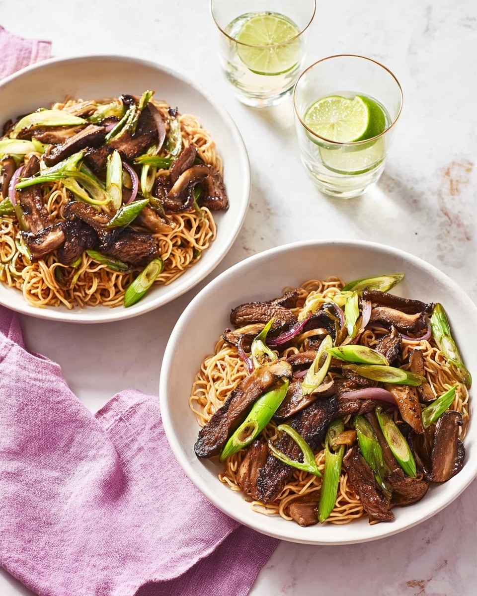 Two white bowls filled with stir-fried noodles sit on a white marbled surface. Each bowl contains a mix of light brown, slightly glossy noodles as the base layer, with pieces of browned beef strips scattered throughout, sitting on top. Dark brown, cooked mushroom slices are mixed in, their texture slightly wrinkled and shiny. Bright green chopped scallions are spread across the dish, adding color contrast. Around the bowls, there are two clear glasses with lime wedges, and folded pastel pink and lavender cloth napkins near the bowls. photo taken with an iphone --ar 4:5 --v 7
