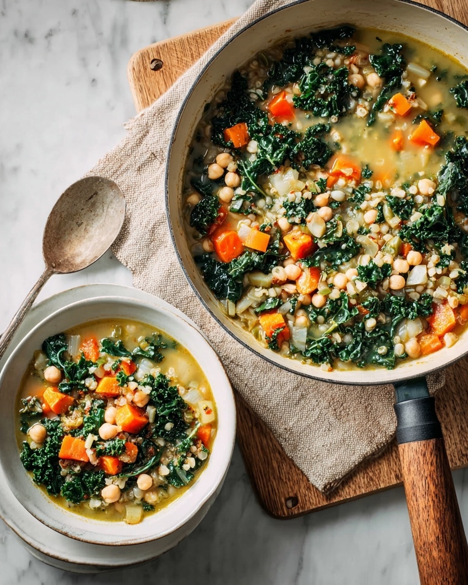A white pan filled with a hearty soup showing three main layers: the bottom layer is a light greenish broth with a slightly oily texture, the middle layer contains diced orange carrots and white beans, and the top layer is dark green curly kale leaves scattered evenly throughout. Next to it, there is a white bowl filled with the same soup, resting on a white marbled surface, with the soup clearly showing the colorful mix of ingredients. The pan has a light wooden handle and is placed on a beige cloth over a wooden board. photo taken with an iphone --ar 4:5 --v 7